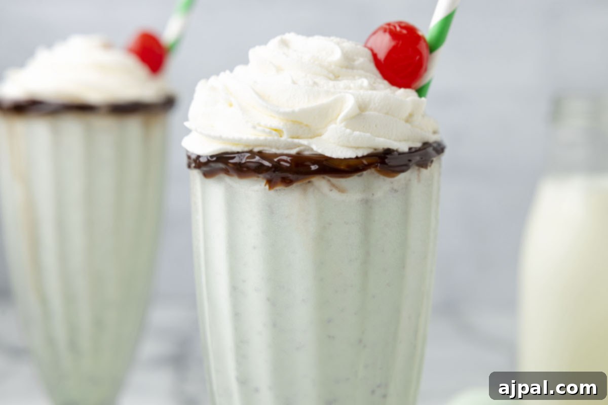 Cool Mint Swirl 4 Two creamy mint milkshakes, beautifully topped with whipped cream and cherries, made effortlessly with a blender.
