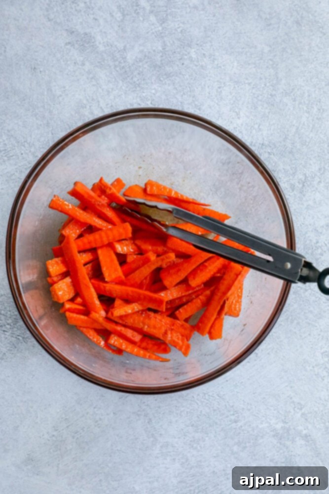 picture of carrots sliced into fry shapes