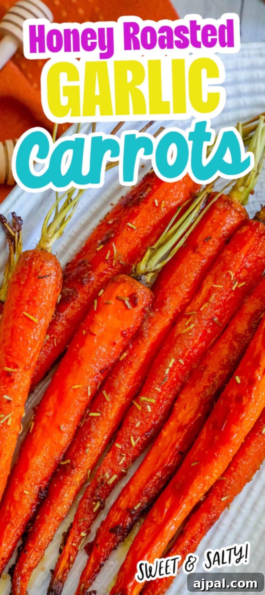picture of honey garlic carrots on a plate with herbs