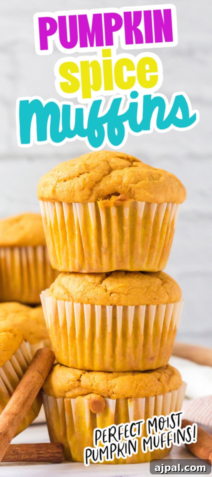 picture of pumpkin spice muffins stacked on a table