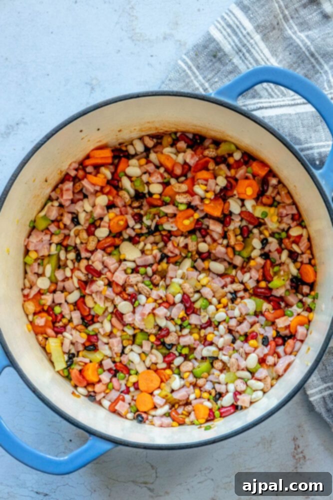 Smoked Ham and Bean Stew 8 picture of beans in dutch oven with browned vegetables
