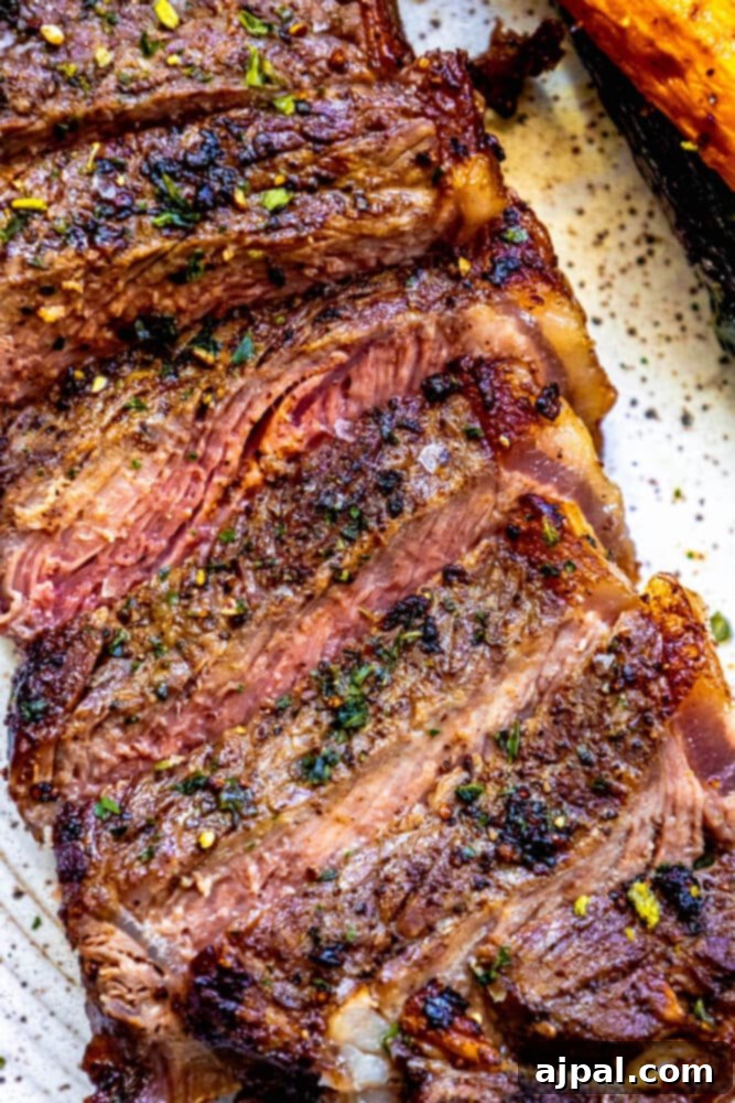 Shadow Sear Steak 2 An indoor grilled steak served with a side of sweet potato.