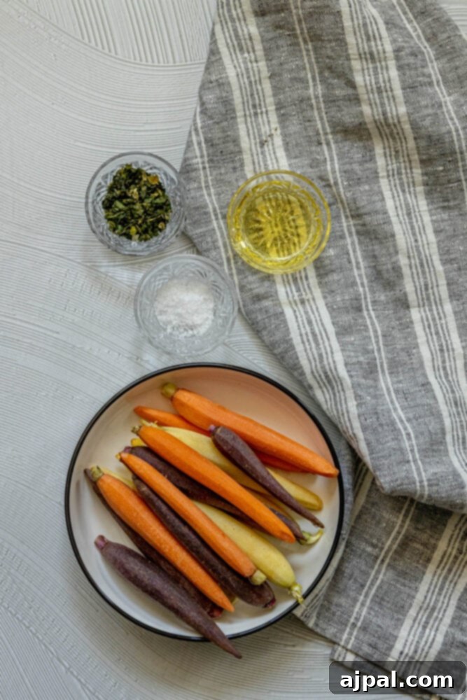A plate of herbed grilled carrots on a table.