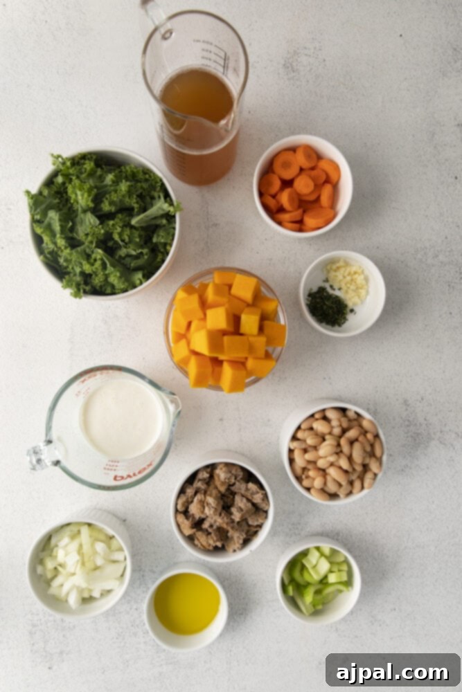 Autumn Harvest Turkey Chili 4 kale, cooked ground turkey, carrots, beans, cream, and vegetables in cups on a table