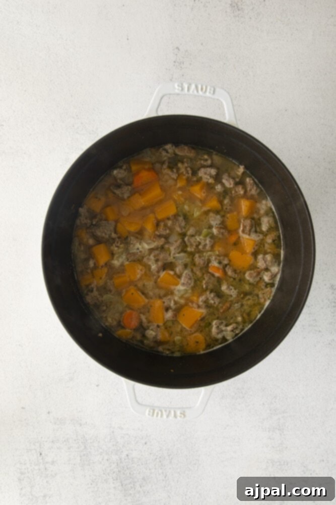 Autumn Harvest Turkey Chili 5 ground turkey with stock and sweet potatoes in a pot
