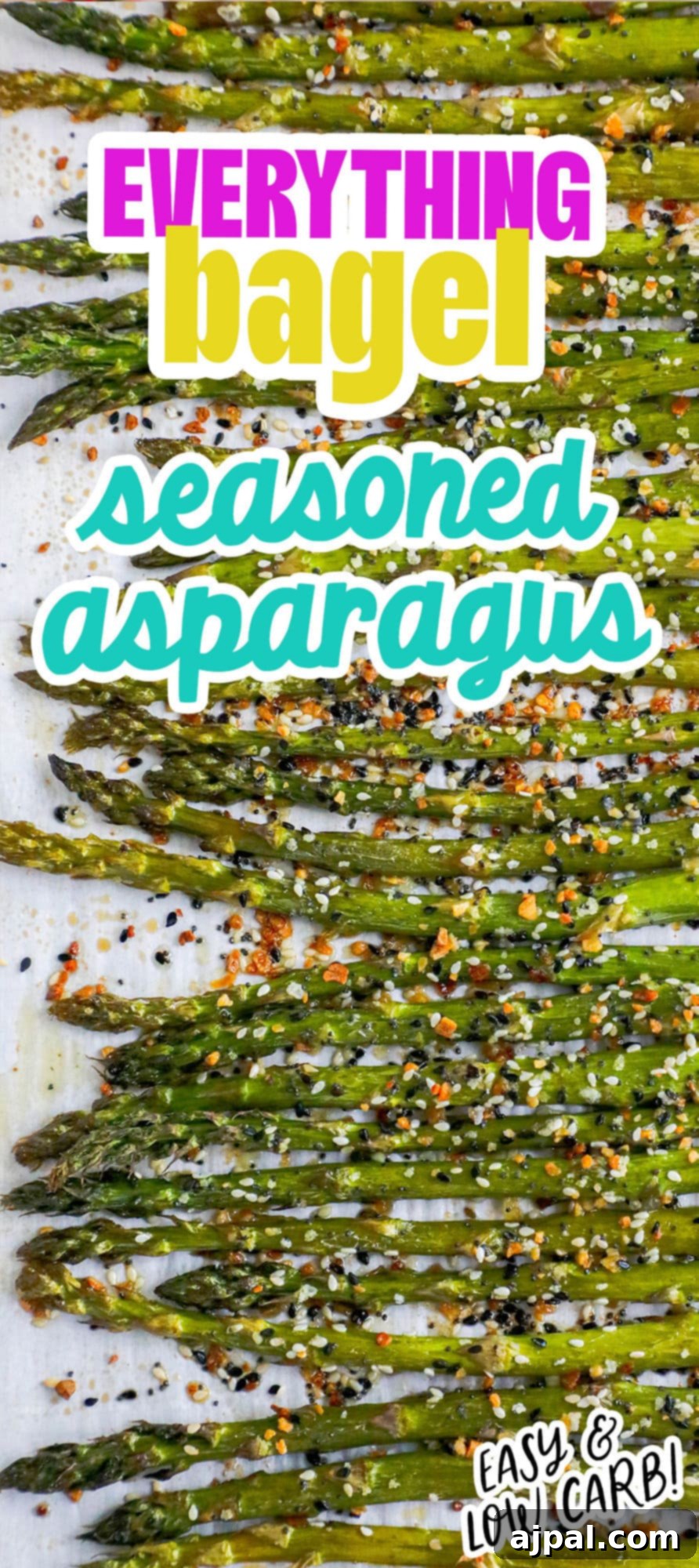 Vertical shot of everything bagel seasoned asparagus on a plate, garnished.