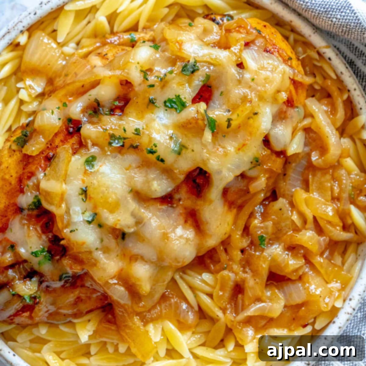 Classic French Onion Chicken Breasts 3 picture of chicken breast with melted cheese and browned french onions
