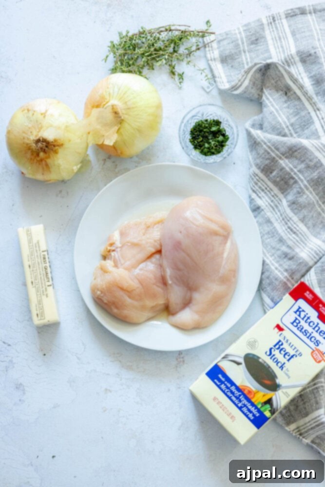 Classic French Onion Chicken Breasts 4 Plate with French onion chicken breast and milk bottle.