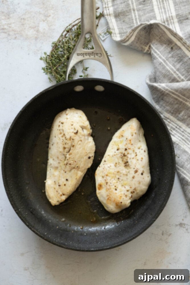 Classic French Onion Chicken Breasts 5 picture of chicken browning in a pan