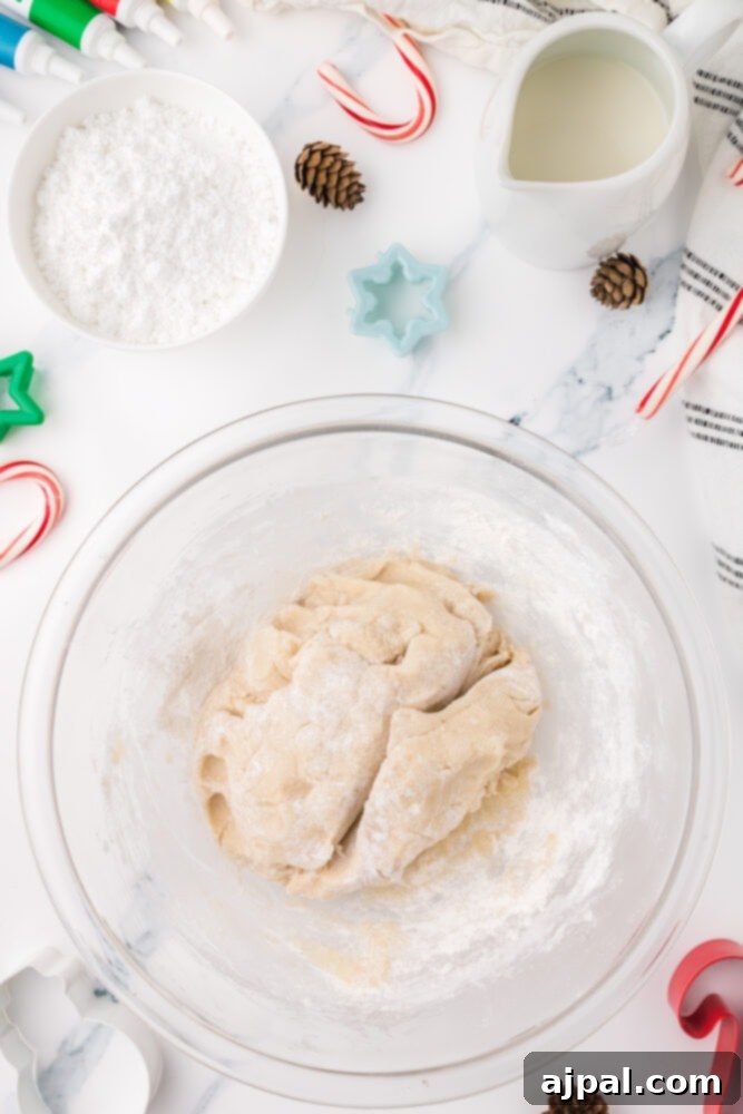 Simple Frosted Christmas Sugar Cookies 7 picture of sugar cookie dough being mixed in a bowl