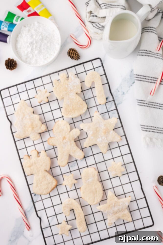Simple Frosted Christmas Sugar Cookies 10 picture of baked sugar cookies on a cooling rack