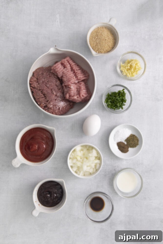 Ingredients for air fried meatloaf on a white background.