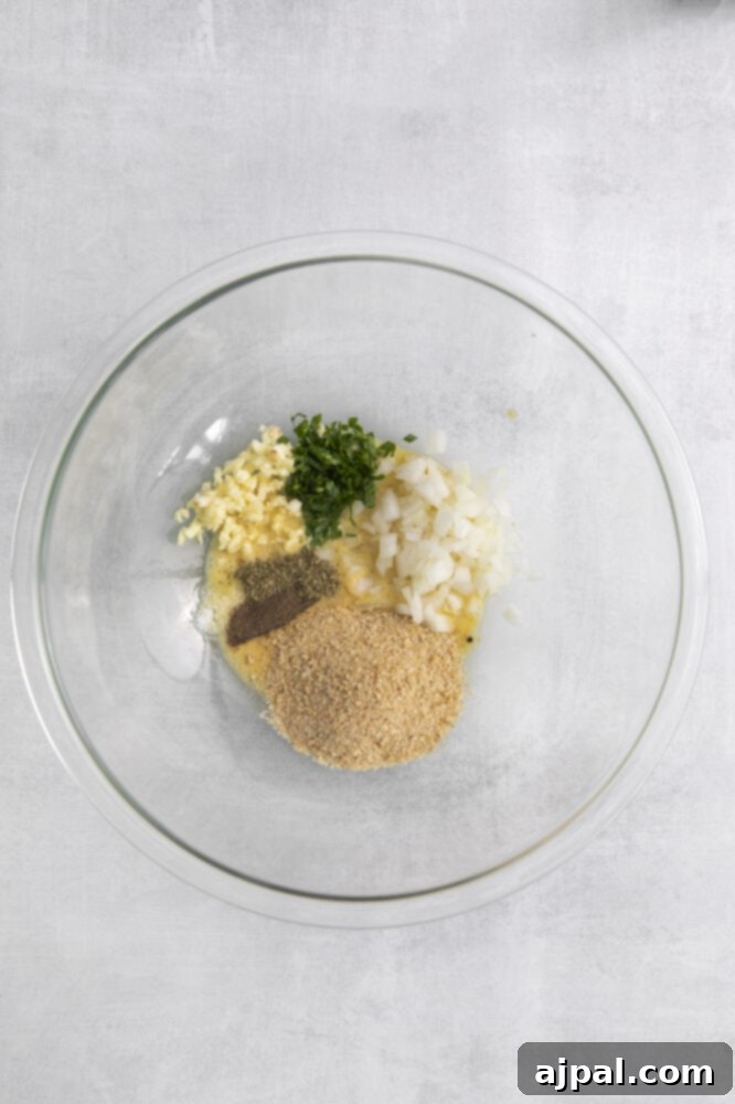 An air fryer meatloaf prepared in a glass bowl.