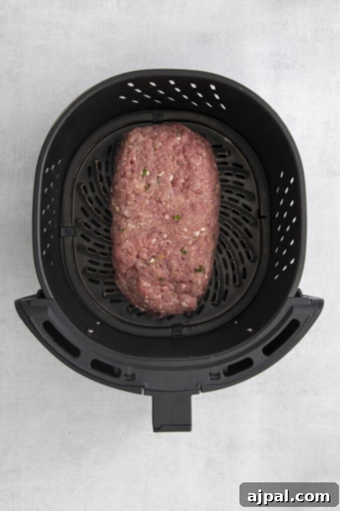 Air fried meatloaf cooked to perfection in an air fryer, delivering a delicious and healthier alternative to traditional oven-baked meatloaf.