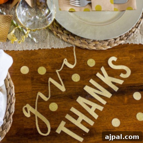 Gold confetti spelling "give thanks" on a festive table setting, symbolizing gratitude and celebration.