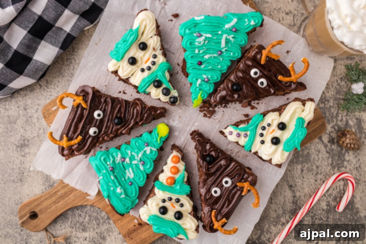 A collection of beautifully frosted Christmas brownies, artfully decorated and arranged on a wooden cutting board, accompanied by candy canes.