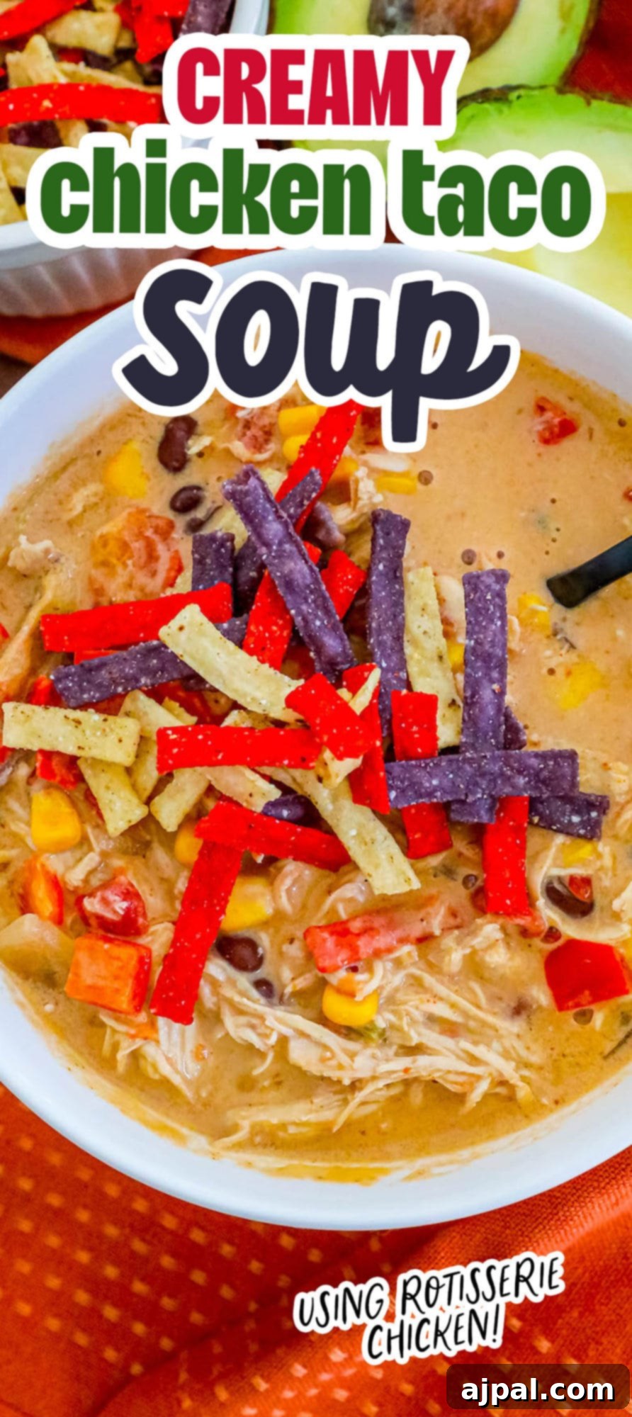 creamy chicken soup with beans, corn, rotel, and tortilla strips in a white bowl