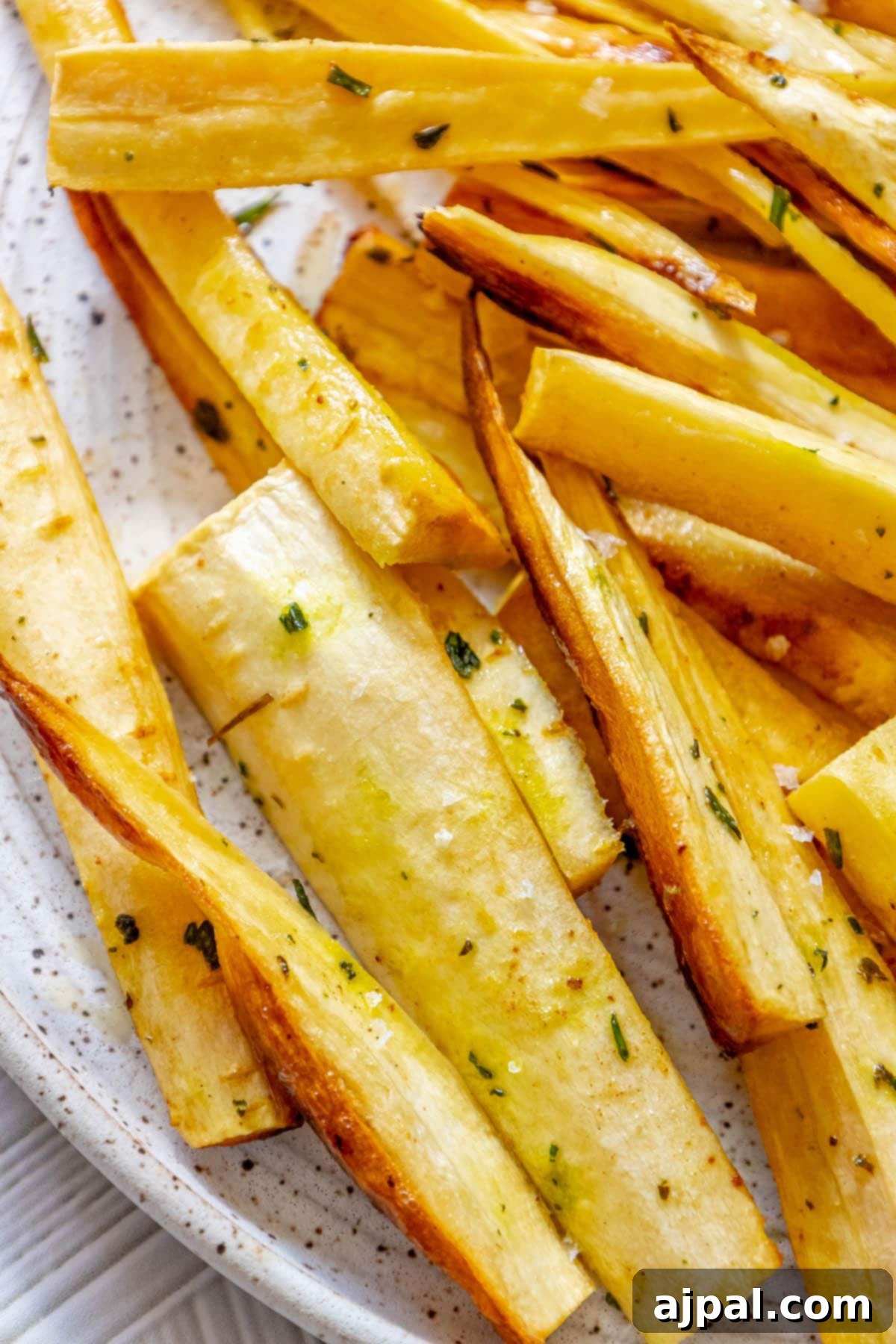 roasted parsnips seasoned with garlic butter and herbs 