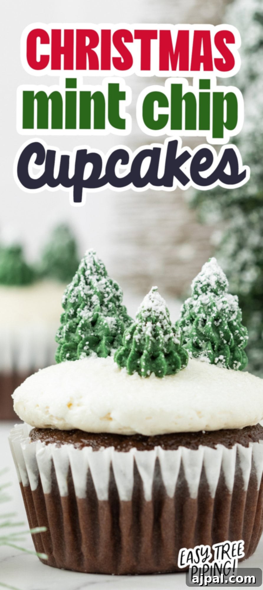 A beautifully decorated Christmas mint chip cupcake, ready to be enjoyed as a festive holiday treat.