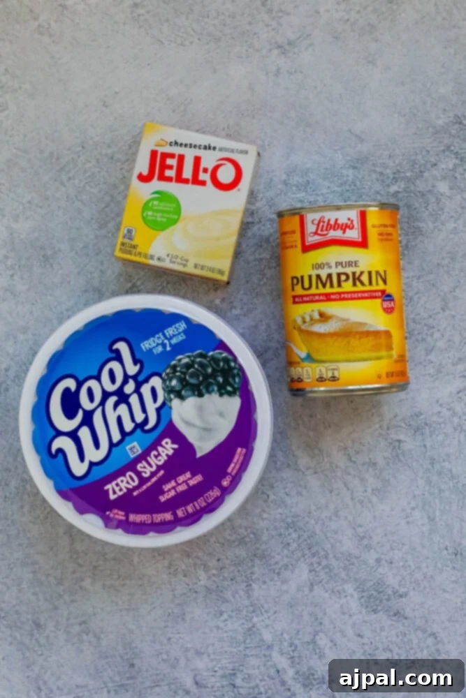 cool whip, pumpkin pie, and jello mix on a table