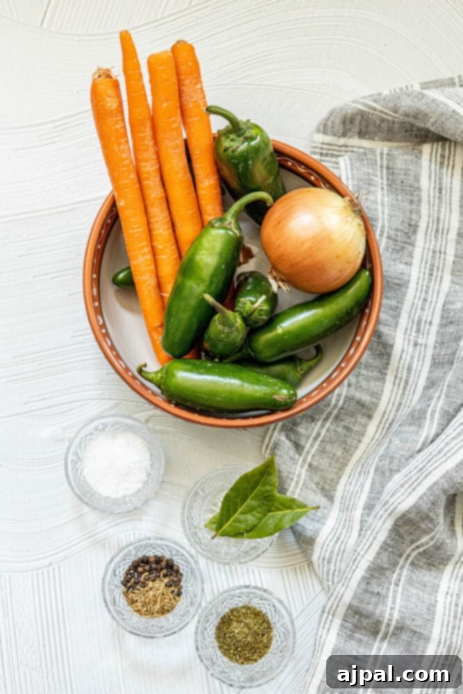 Zesty Carrot Jalapeno Relish 5 a bowl with carrots, jalapenos, onions, and herbs in it next to bowls with herbs and spices on a table