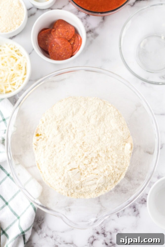 A glass bowl filled with pizza dough that has risen beautifully, placed on a table, signifying a successful proofing.