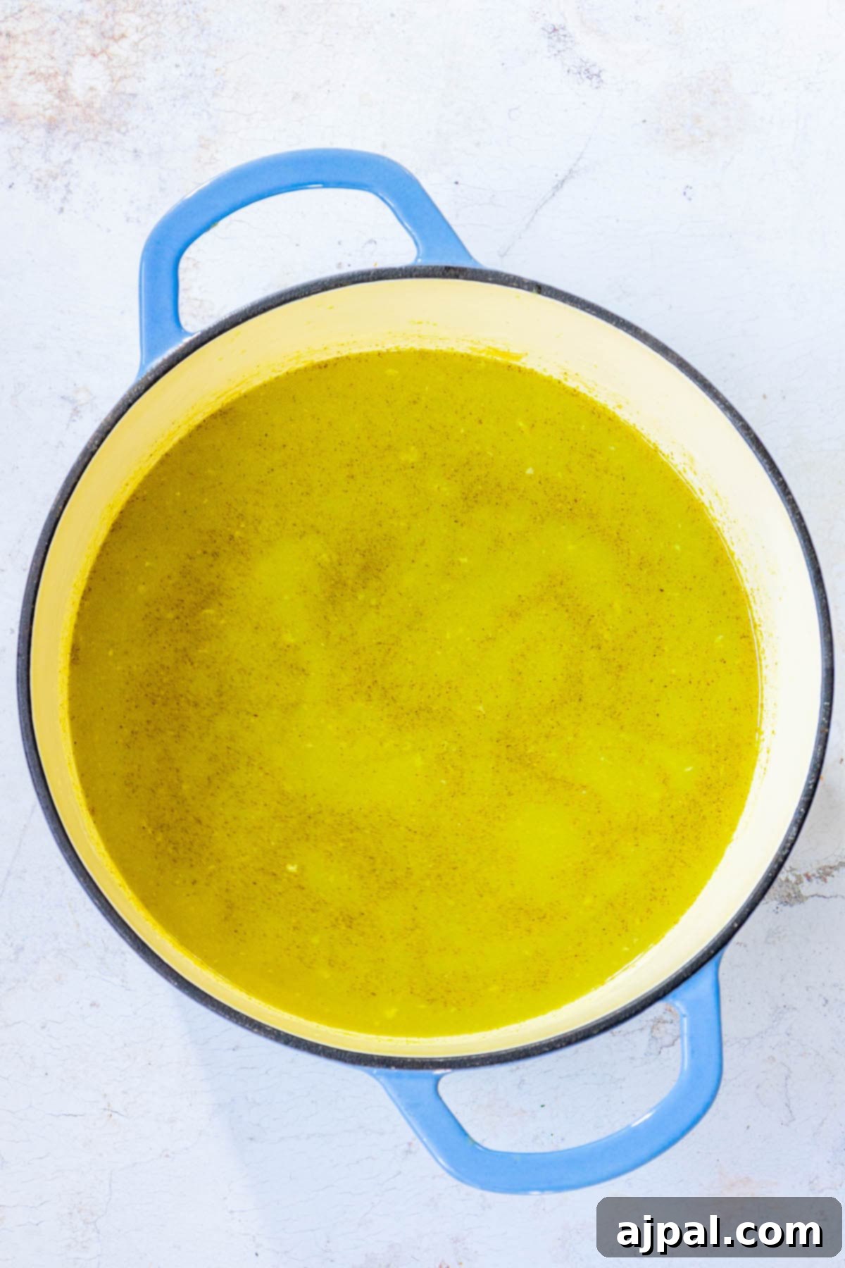 tomatillo stew base in a pot