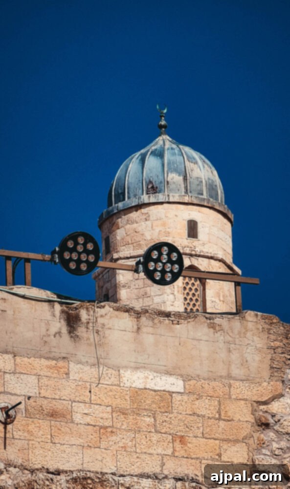 Authentic Jerusalem Salad 6 Minaret at Dome on the Rock in Jerusalem, a beautiful architectural detail against the sky.