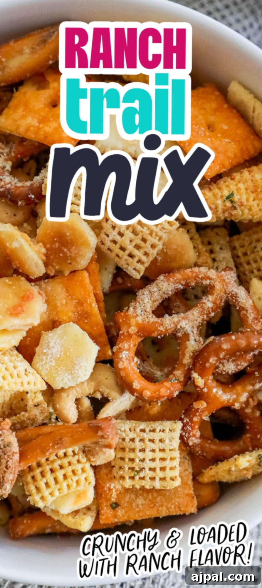 Homemade ranch Chex mix presented in an elegant white bowl, ready to be enjoyed.