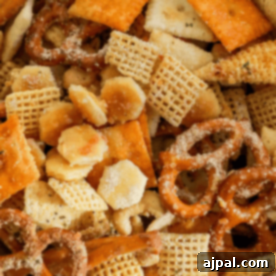 A bowl of Chex mix with pretzels and a savory ranch seasoning.