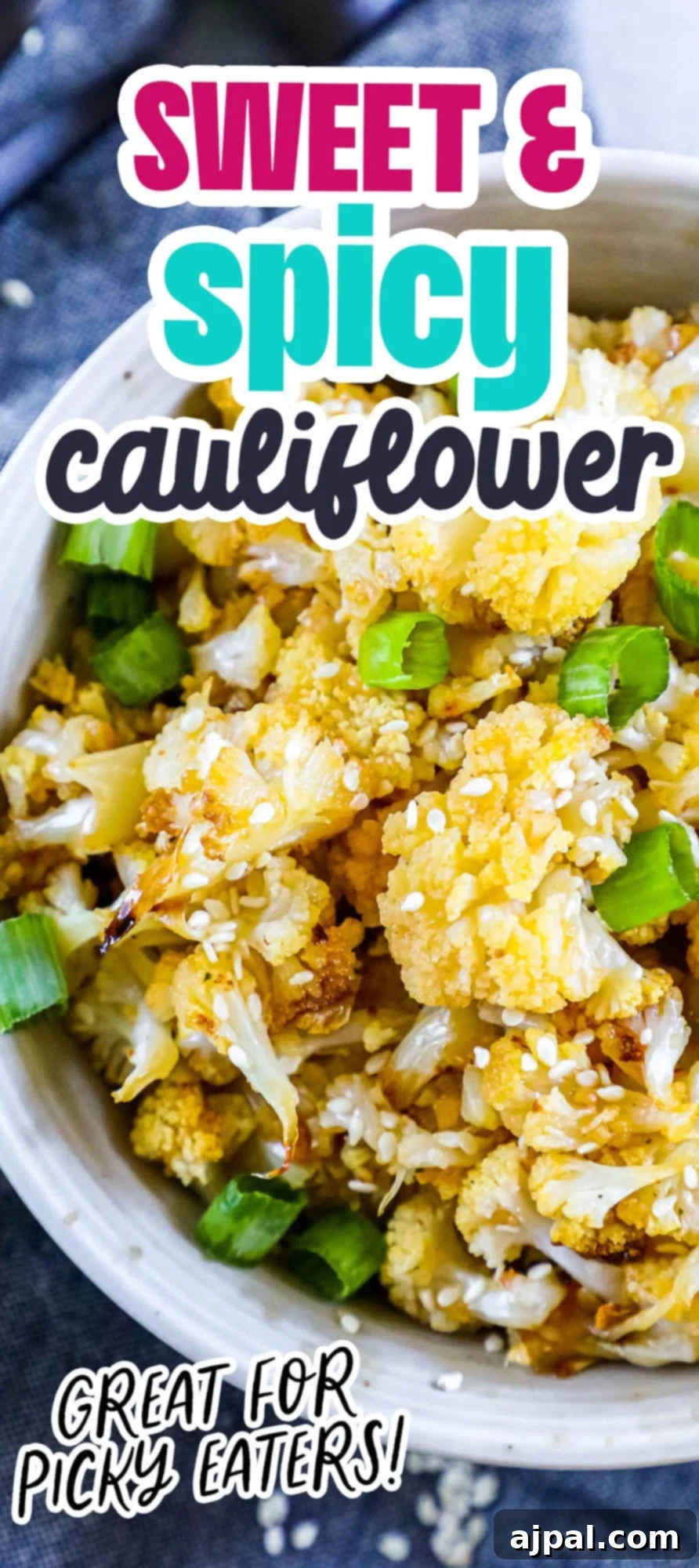 A close-up shot of easy sweet and spicy cauliflower in a white bowl, garnished with green onions and sesame seeds, highlighting its vibrant flavors.