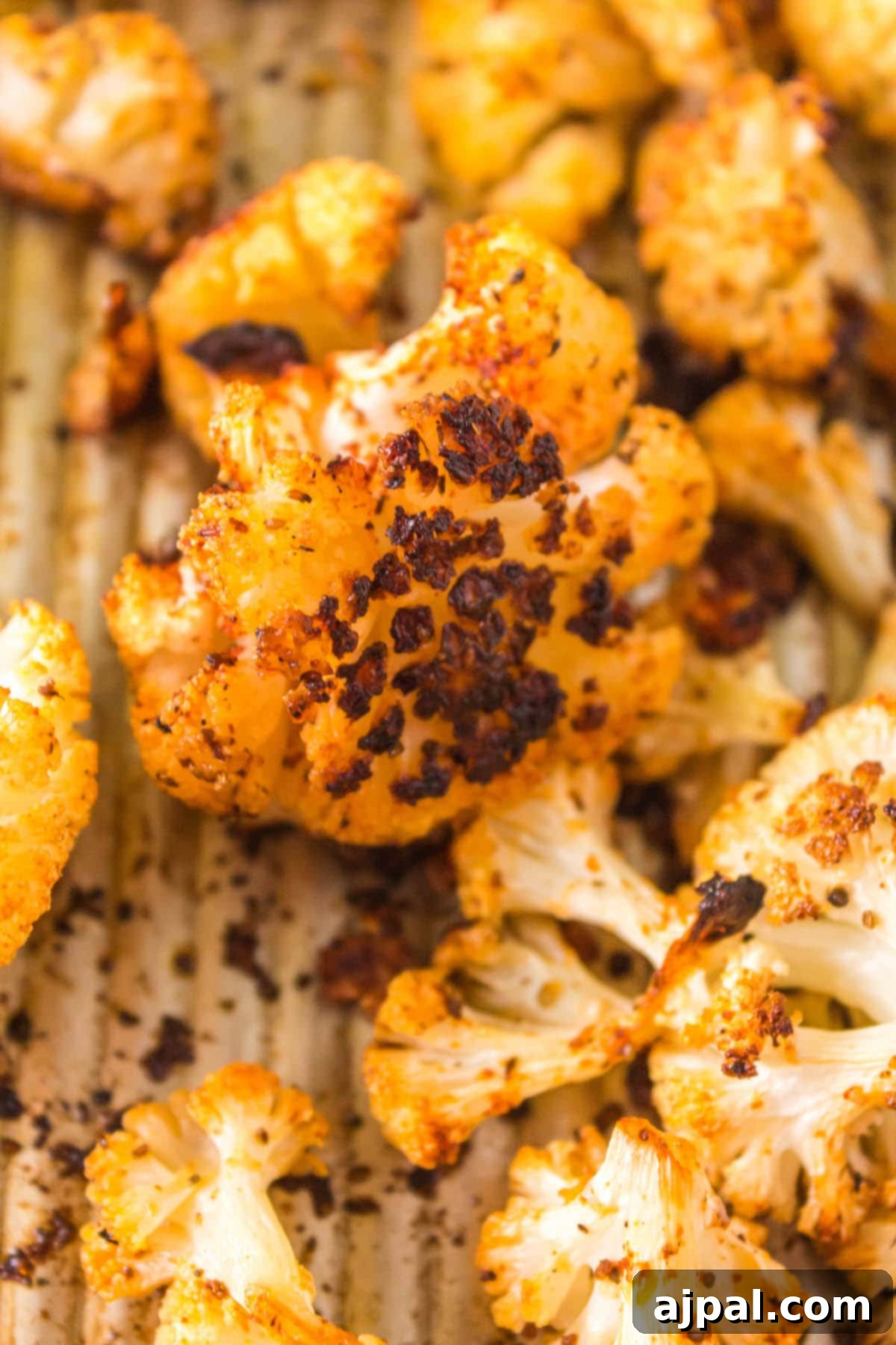 browned cauliflower on a tray