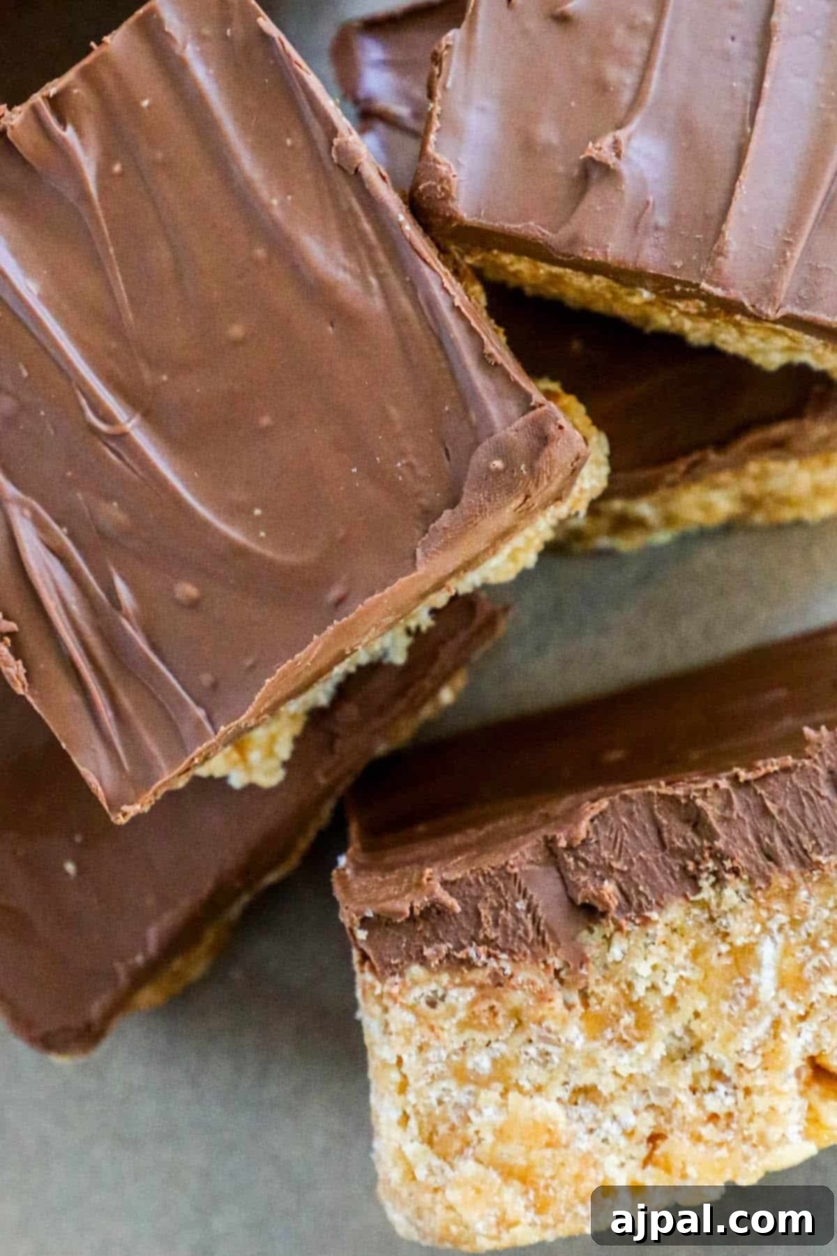 A stack of scotcheroos - chocolate covered graham cracker bars.