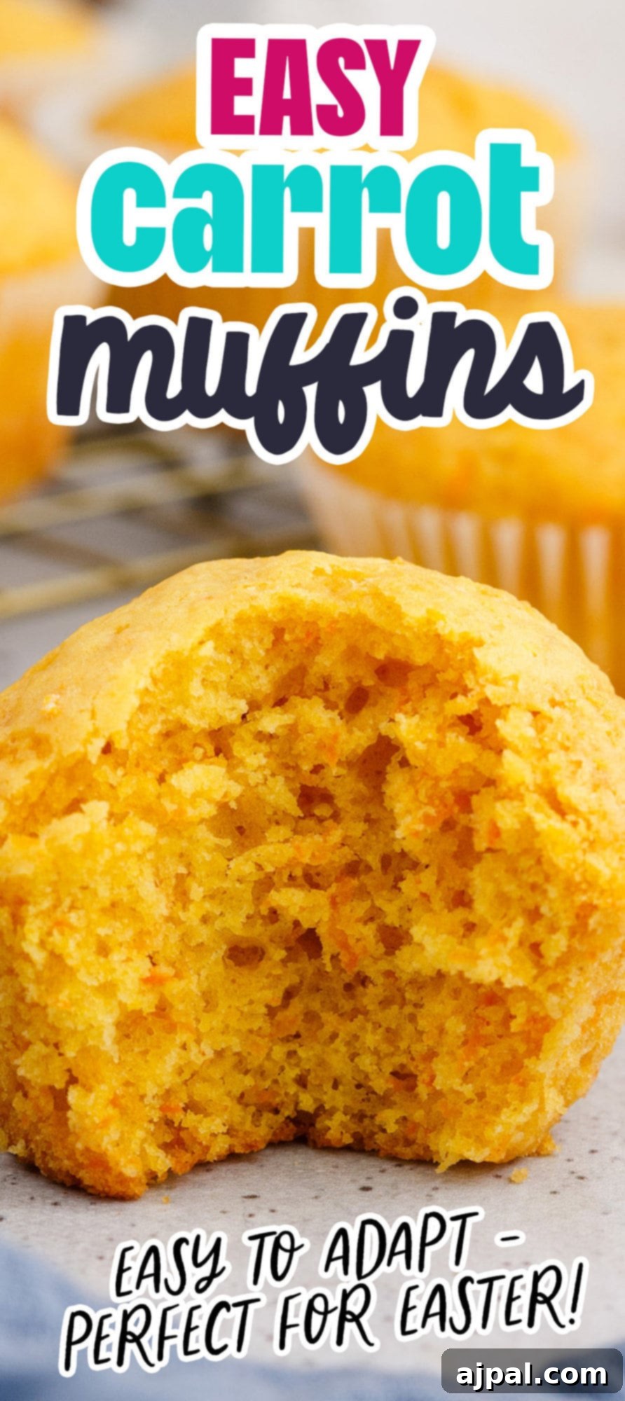 Effortless Carrot Muffins 16 A baked carrot muffin with a large bite taken out, clearly showing the light and airy texture of the muffin's interior.