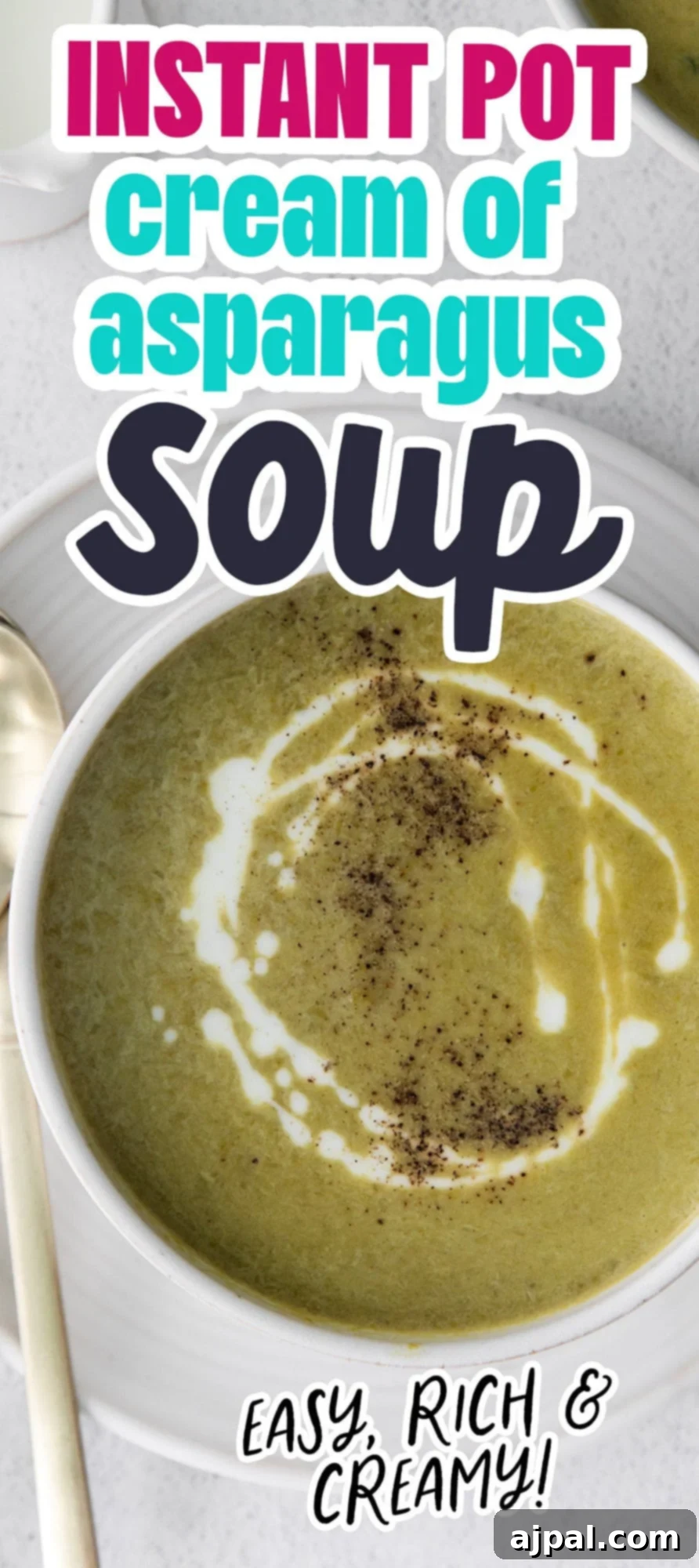Velvety Instant Pot Asparagus Soup 11 creamy asparagus soup in a white bowl with a swirl of cream on top and lots of fresh cracked pepper