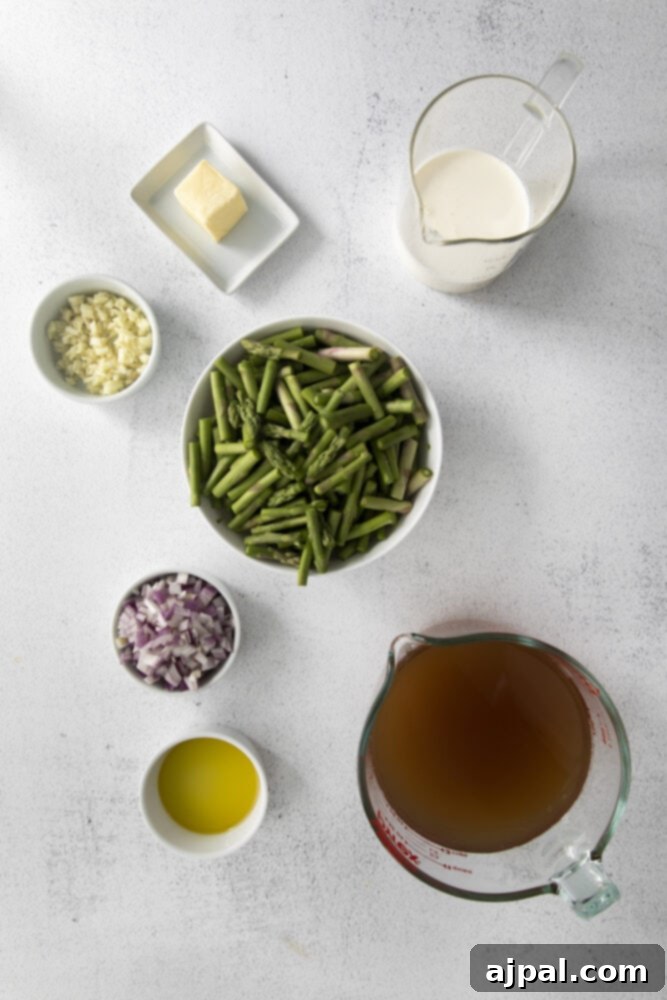 Velvety Instant Pot Asparagus Soup 5 cream, butter, shallots, garlic, stock, asparagus on a table