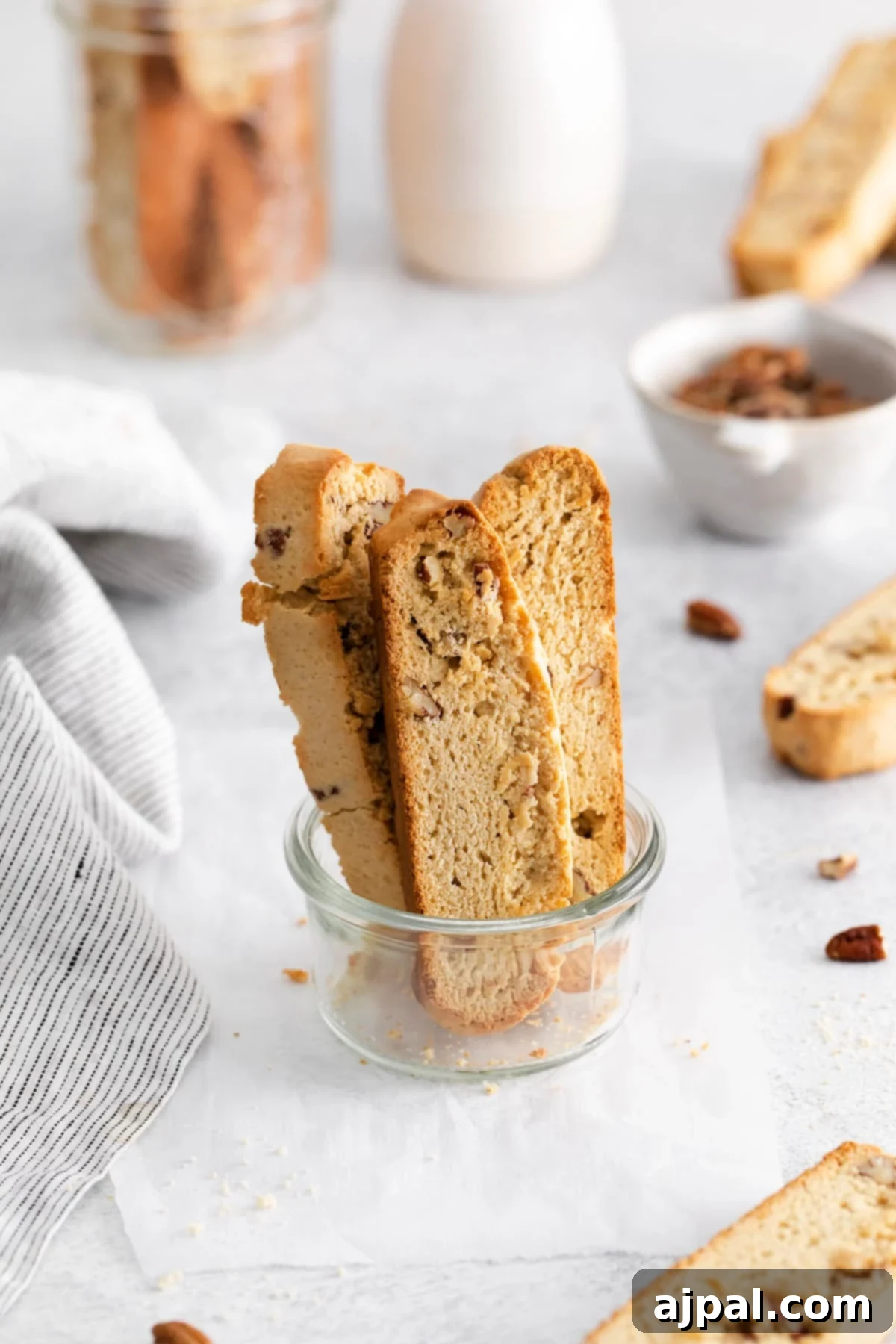 Artisan Maple Pecan Biscotti 12 Baked biscotti with pecan in a jar on a table