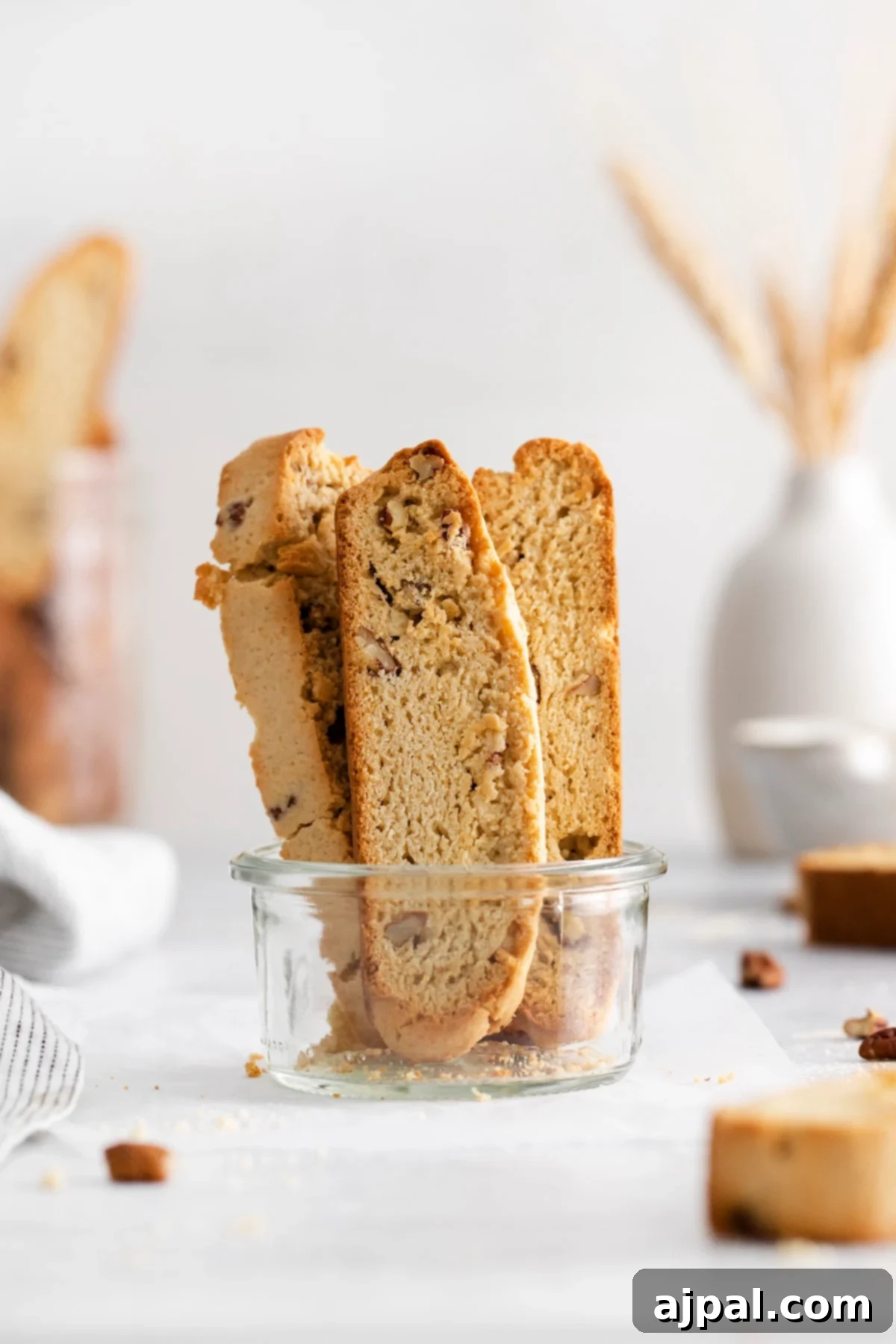 Artisan Maple Pecan Biscotti 3 Baked biscotti with pecan in a jar on a table, ready to be served