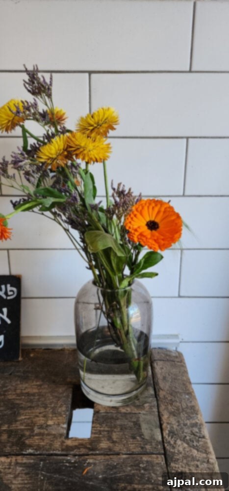 Skhug Zhoug Sauce Recipe 8 A simple yet elegant arrangement of fresh flowers in a glass jar, capturing the essence of natural beauty and the fresh, organic bounty harvested at Farma Cultura.