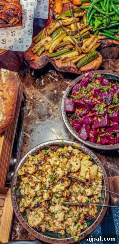 An inviting breakfast spread featuring tahini roasted cauliflower alongside various Israeli delicacies.