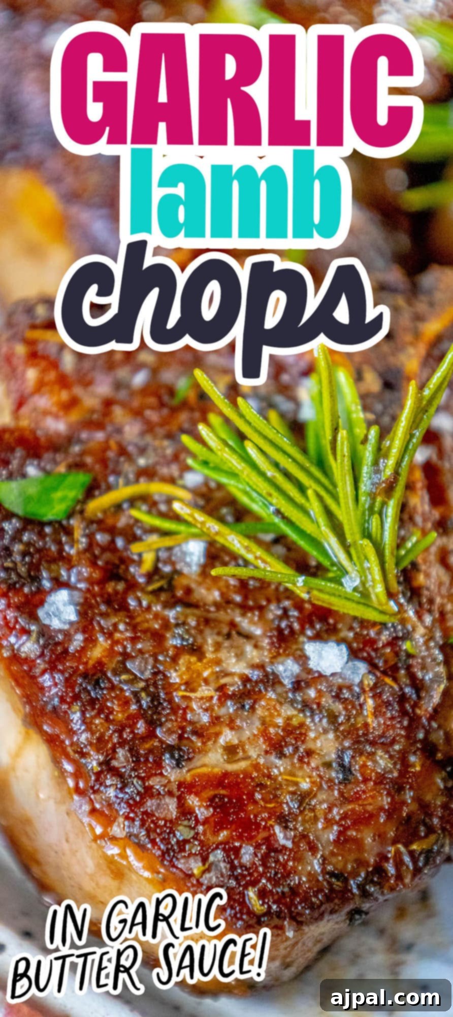 seared lamb chop on a white plate with a sprig of rosemary and sea salt flakes and a white wine shallot sauce on top