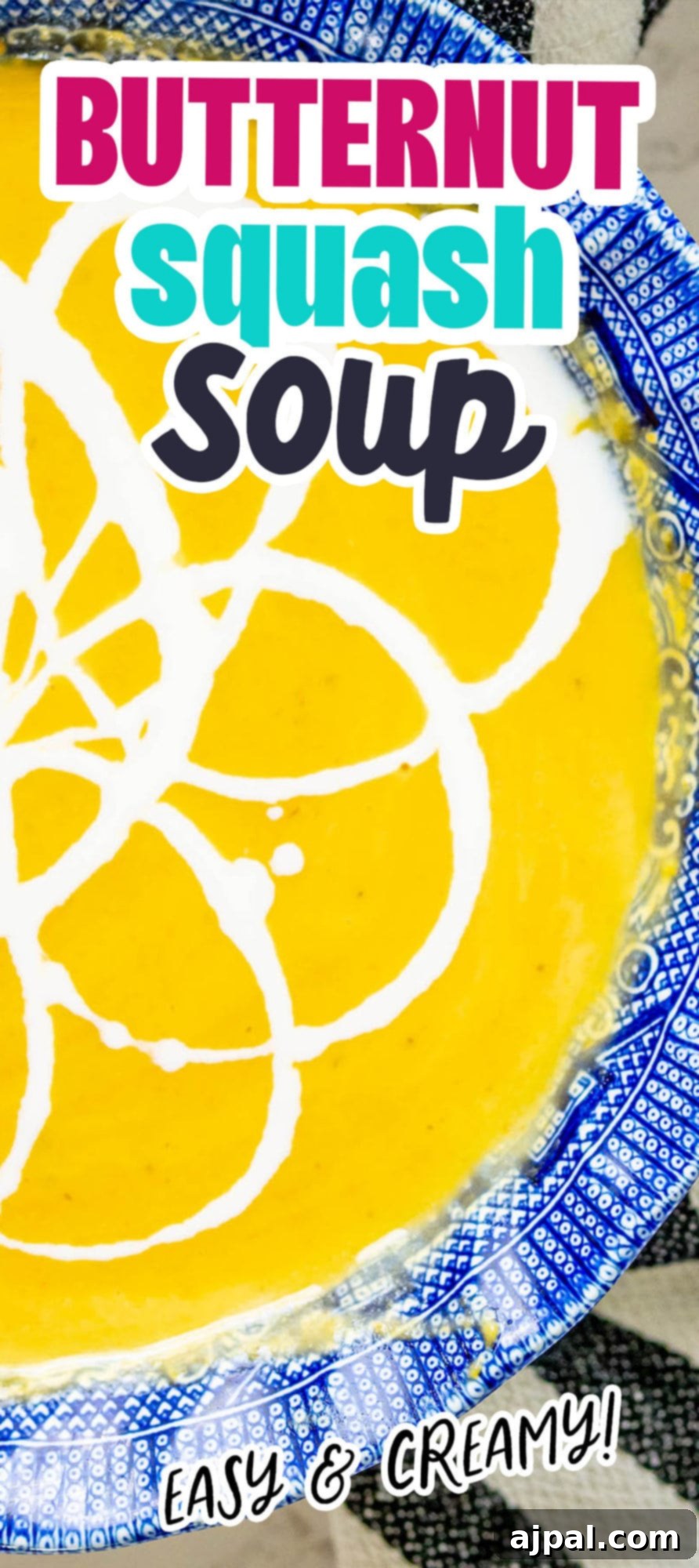 Golden Butternut Perfection 14 yellow soup with white cream decoration