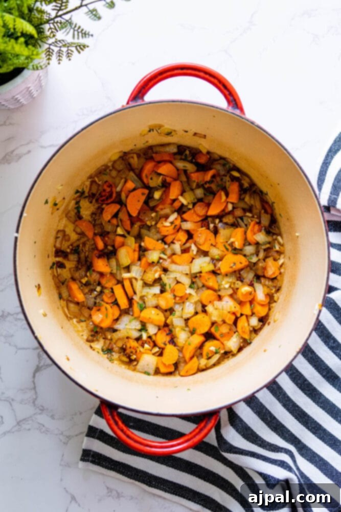 Golden Butternut Perfection 7 sauteed onion, celery, and carrots in a dutch oven