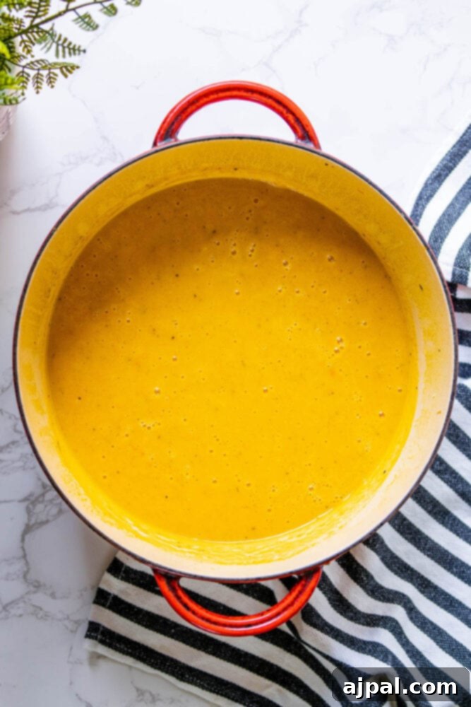Golden Butternut Perfection 10 creamy orange soup in a dutch oven