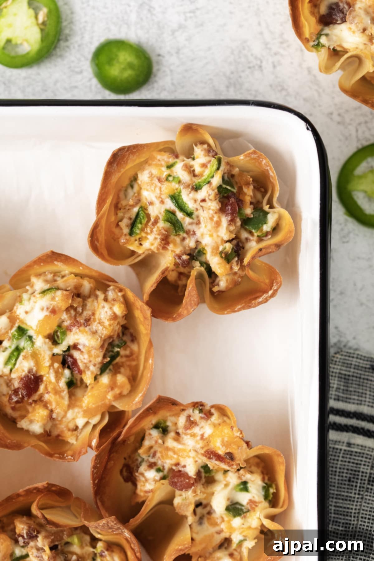 toasted phyllo cup with creamy jalapeno popper mix baked in it