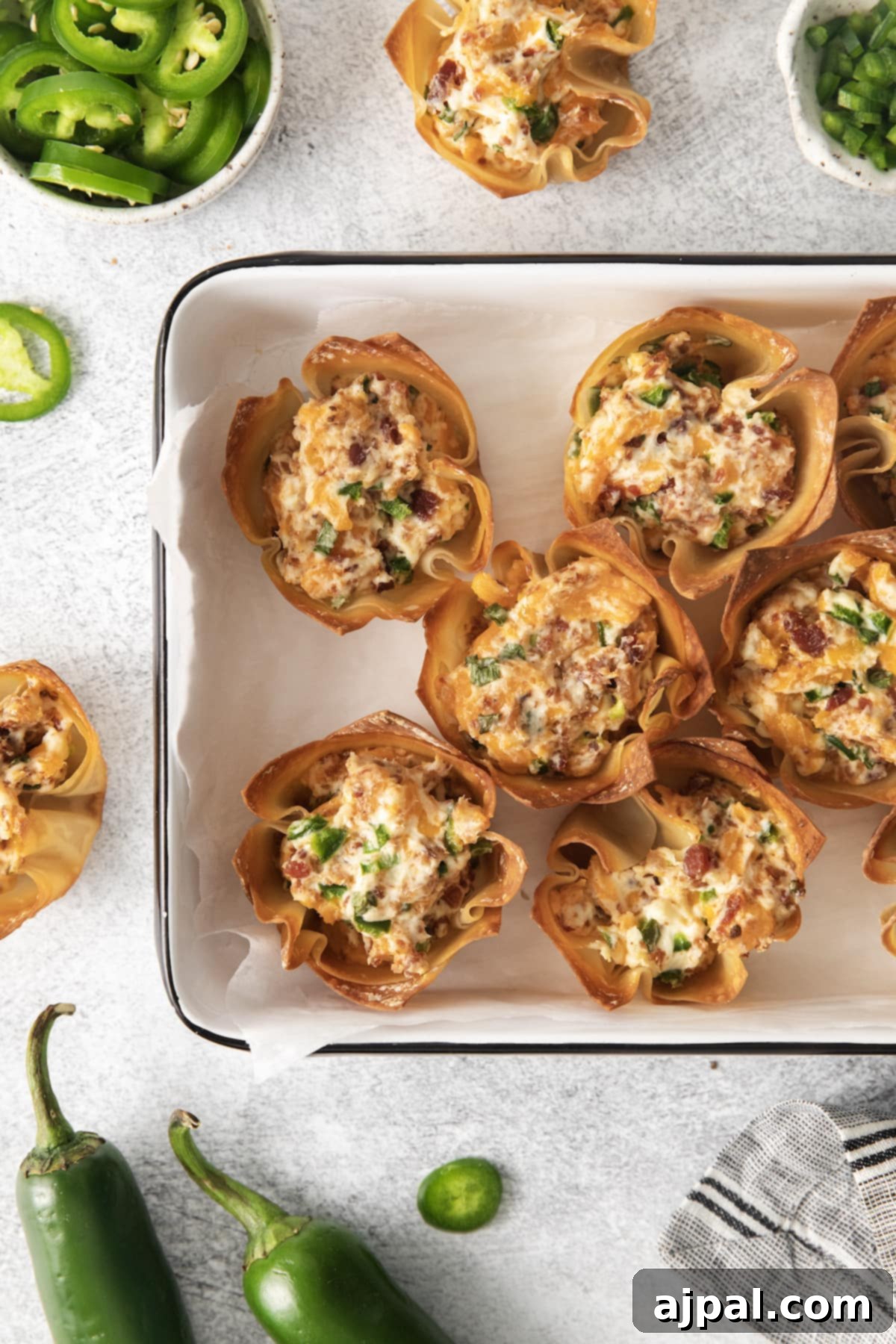 toasted phyllo cup with creamy jalapeno popper mix baked in it