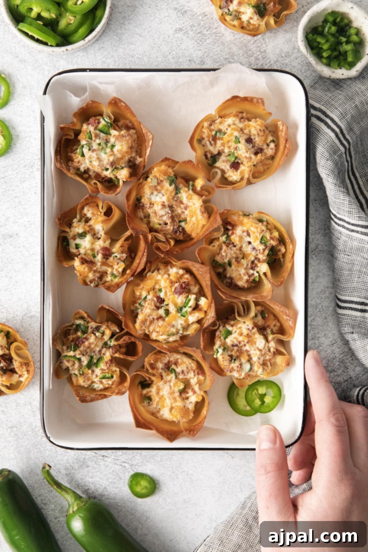 toasted phyllo cup with creamy jalapeno popper mix baked in it
