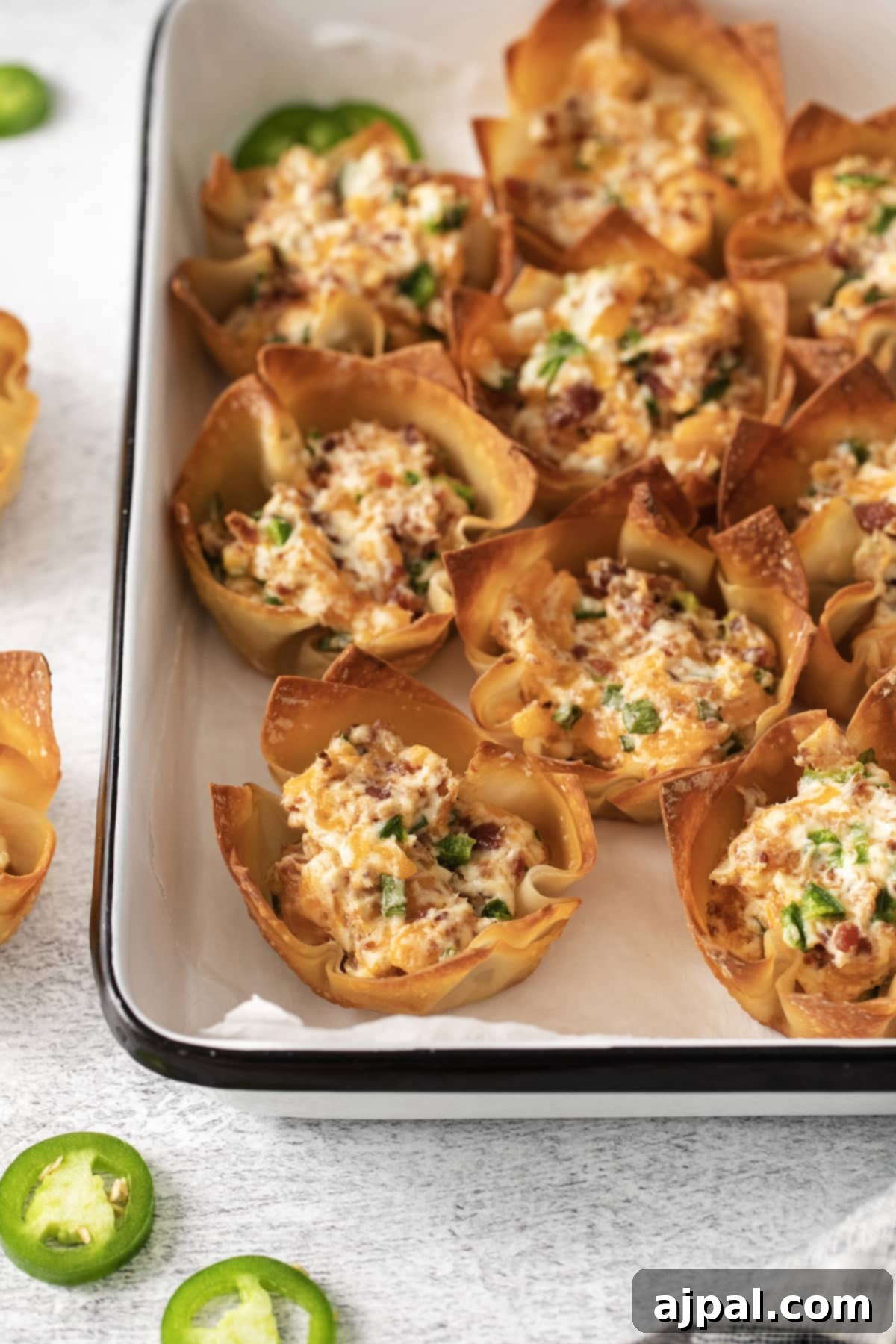 toasted phyllo cup with creamy jalapeno popper mix baked in it