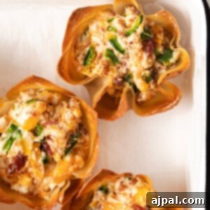 toasted phyllo cup with creamy jalapeno popper mix baked in it