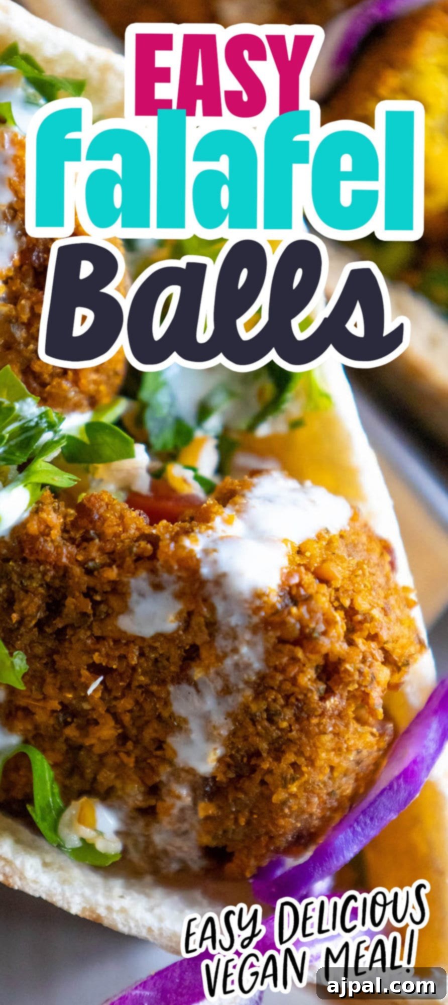a pita stuffed with falafel balls, cabbage, and salad with tahini sauce ladled on top